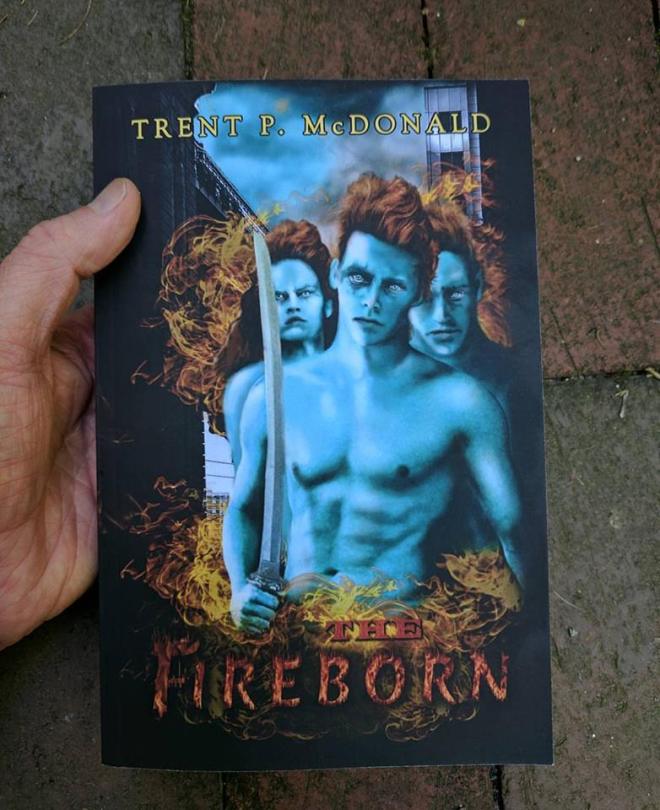 fireborn-book-in-hand (1)